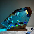 Close-up of epoxy resin ocean lamp – detailed killer whale, sea turtle, and diver couple, perfect handmade marine décor gift